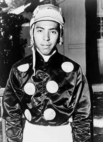 ANGEL CORDERO (1942- ). Puerto Rican horse racing jockey. Photograph, 1964