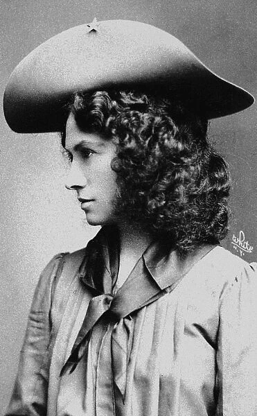 ANNIE OAKLEY (1860-1926). American markswoman. Photographed c1902