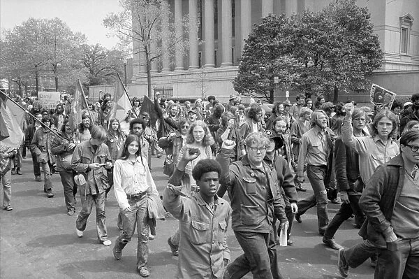 ANTI-WAR PROTEST, 1971. Men and women at an anti-war protest in front of the Department