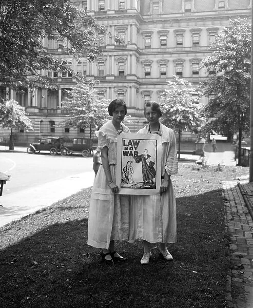ANTI-WAR PROTEST, c1920. Two women holding an anti-war poster in Washington, D