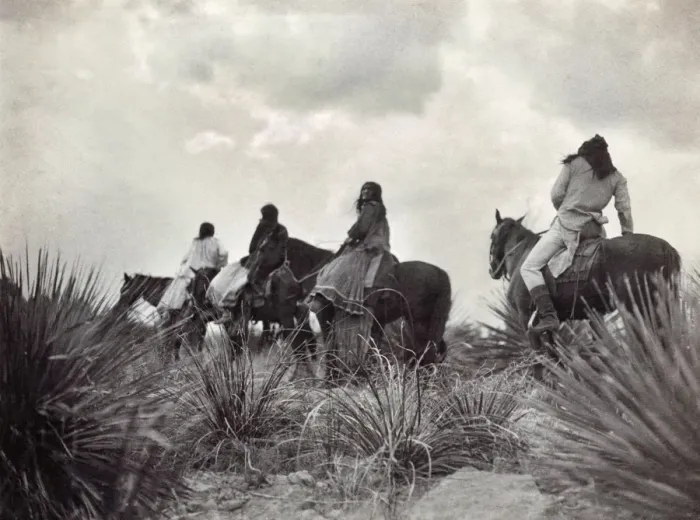 Framed Print : APACHE ON HORSEBACK, c1906. Before the storm. A group of Apache men and women on horseback. Photograph by Edward Curtis, c1906