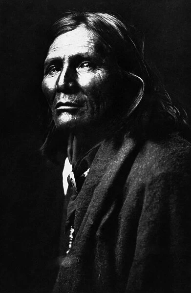 APACHE MAN, 1906. Alchise, an Apache Native American man. Photographed by Edward S