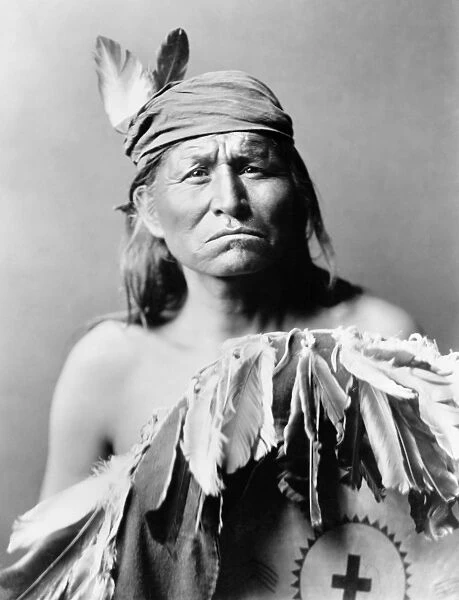 APACHE MAN, c1903. Portrait of an Apache man. Photograph by Edward Curtis, c1903
