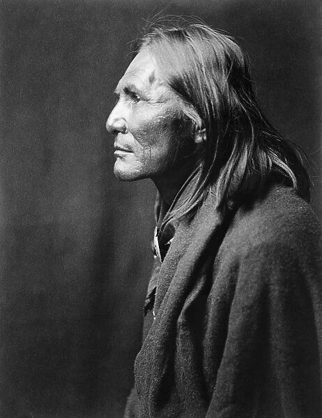 APACHE MAN, c1906. Alchise, an Apache Native American. Photograph by Edward Curtis, c1906