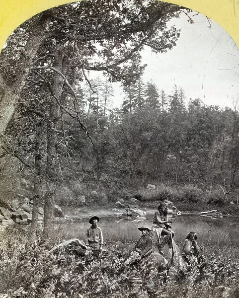 APACHE SCOUTS, 1873. A group of Coyotero Apache scouts at Apache Lake in the Sierra Blanca