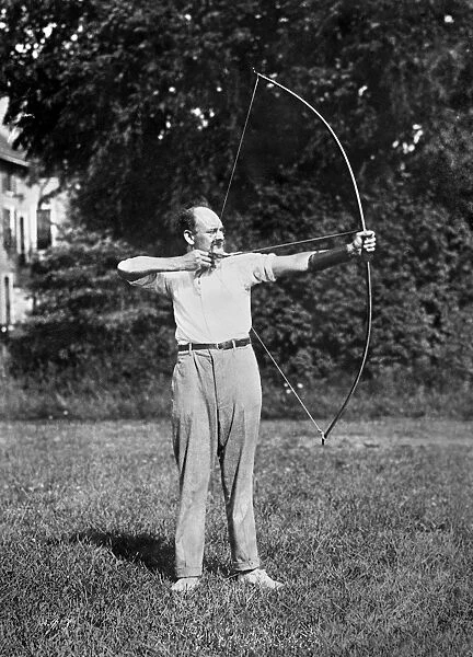 ARCHERY, c1915. American archer Louis C