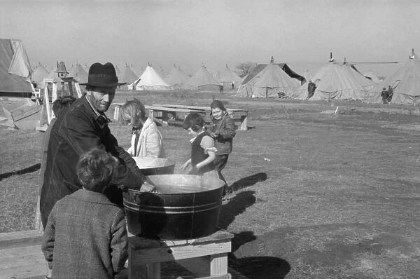 ARKANSAS: FLOOD CAMP, 1937. Washing up facilities in a camp for white flood refugees