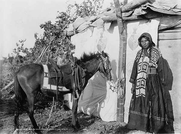 ASSINIBOIN GIRL, c1907. Irene Rock, an Assiniboin schoolgirl, with her pony at