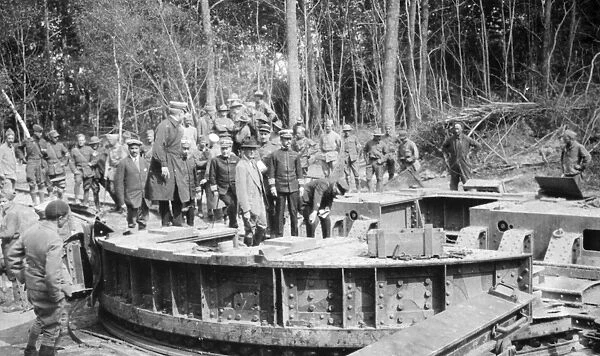 Assistant Secretary of the Navy Franklin D. Roosevelt (wearing fedora) inspecting a Big Bertha gun emplacement abandoned by the German forces at Brece, France. Photographed 1918