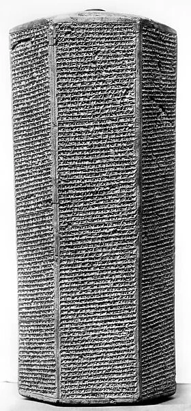 ASSYRIA: SENNACHERIB. Baked clay hexagonal prism inscribed with the annals of Sennacherib