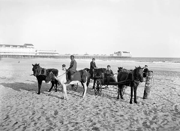 ATLANTIC CITY: HORSES. Five young boys with horses on the beach, on horseback