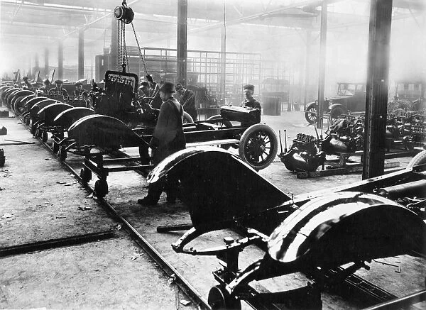 AUTOMOBILE MANUFACTURING. An American auto assembly line, c1910