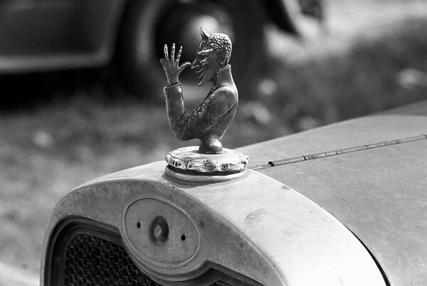 AUTOMOBILE ORNAMENT, 1938. Demon radiator cap, Laurel, Mississippi. Photograph by Russell Lee