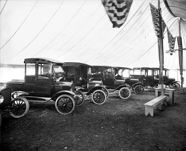 AUTOMOBILE SHOW, c1921. American automobiles on display in a tent, c1921