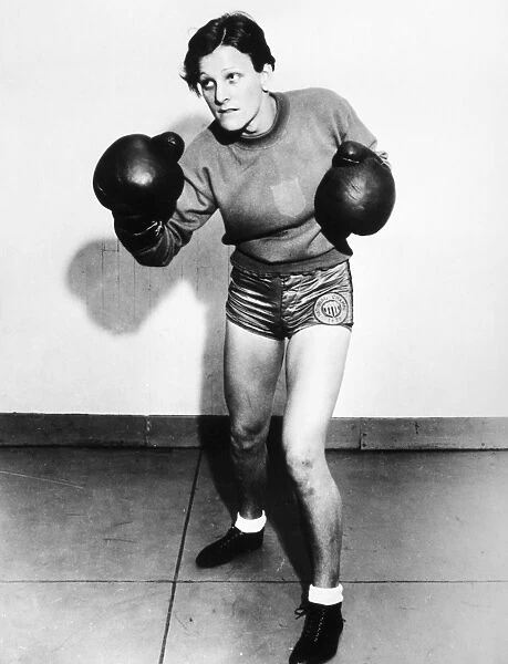 BABE DIDRIKSON ZAHARIAS (1911-1956). NÔÇÜ e Mildred Ella Didrikson. American athlete. In training as a boxer, warming up at Art McGoverns Gym in New York City, 1933