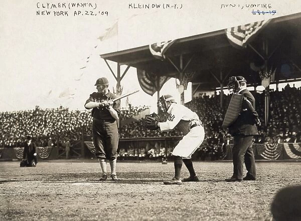BASEBALL GAME, 1909. Baseball game between the Washington Senators and the New York Highlanders, 1909, with Otis Clymer of Washington at bat and Red Kleinow catching