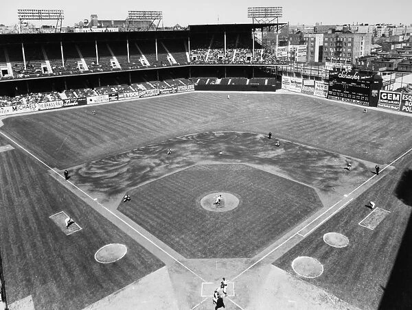 BASEBALL GAME, c1953. Aerial view of Ebbets Field in Brooklyn, New York, during an exhibition game between the New York Yankees (in the field) and the Brooklyn Dodgers, c1953