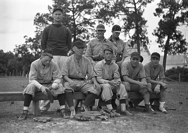 BASEBALL TEAM, 1938. Baseball players at Irwinville Farms, Georgia. Photograph by John Vachon in may 1938