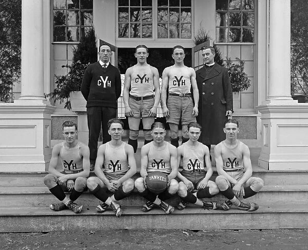 BASKETBALL TEAM, 1920. Portrait of the Yankee basketball team. Photograph, 1920