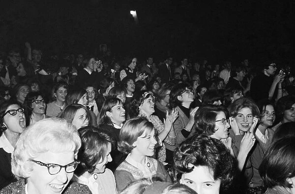 THE BEATLES, 1964. The audience at the Beatles concert at the Washington Coliseum in Washington