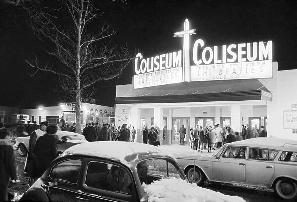 THE BEATLES, 1964. Fans waiting to get in the Washington Coliseum for the first