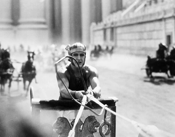 BEN HUR, 1926. Francis X. Bushman as Messala in the climactic chariot race. Silent film still
