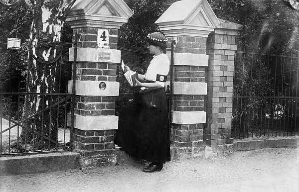 BERLIN: MAIL CARRIER, c1910. A female telegraph messenger in Berlin, Germany. Photograph