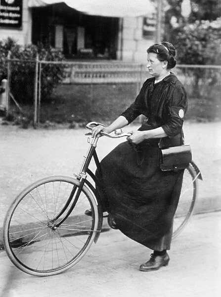 BERLIN: MESSENGER, c1910. A female telegraph messenger in Berlin, Germany. Photograph