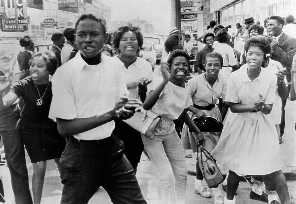 BIRMINGHAM: MARCH, 1963. African American demonstrators march through downtown Birmingham
