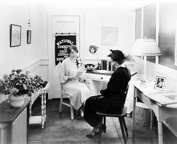 BIRTH CONTROL LOBBY, c1930. Two women in an office of the National Committee