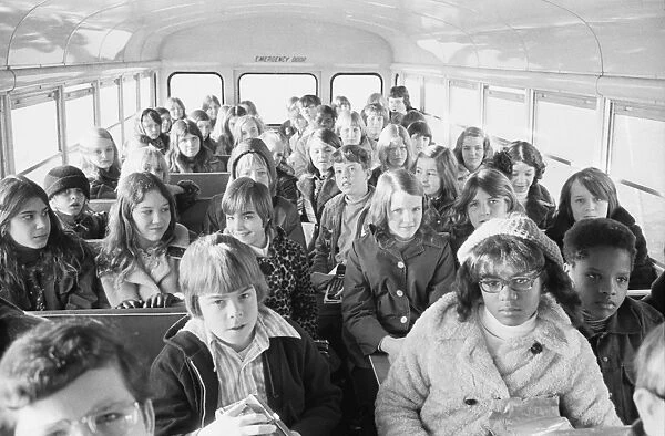 Black and white students from the suburbs of Charlotte, North Carolina, riding on a school bus to an inner city school, 21 February 1973. Photographed by Warren K. Leffler