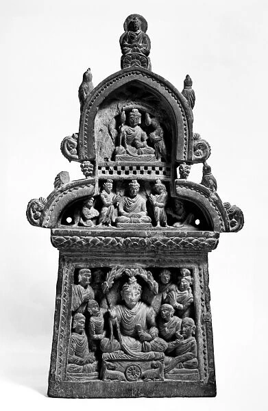 Blind dormer depicting three Buddhas. Top: The Buddha sits with two attendants. Middle: The Buddha sits in meditation with four worshippers. Bottom: The Buddha sits under a sal tree, with five monks representing the first five disciples that the Buddha preached in the Deer Park at Sarnath. Indian, 2nd-3rd century