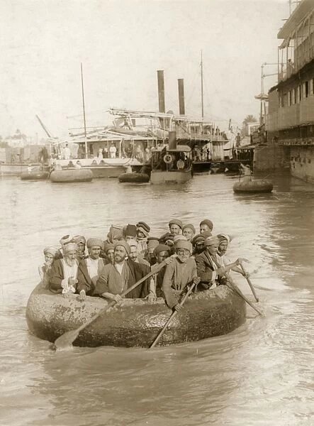 BOATS ON TIGRIS, c1900. Paddling from a steamboat landing on the Tigris River, Baghdad