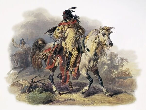 BODMER: BLACKFOOT HORSEMAN. A Blackfoot Native American man riding on horseback at Fort McKenzie, Montana. Aquatint engraving, c1844, after a drawing, 1833, by Karl Bodmer
