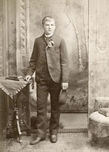 BOY, c1880. Portrait of a boy. Cabinet card from a photography studio in Chicago