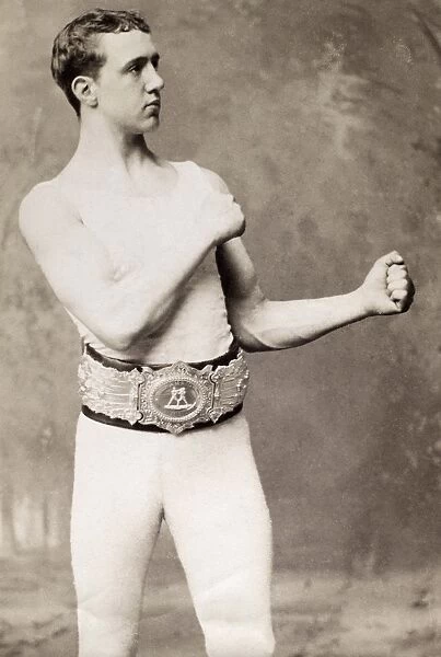 British Empire champion Charlie Mitchell wearing his champion belt, c1883
