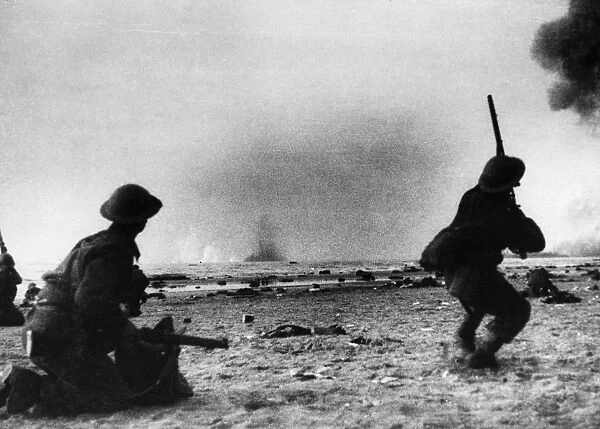 British infantry shooting at German aircraft during the evacuation of Dunkirk, France. Photographed June 1940