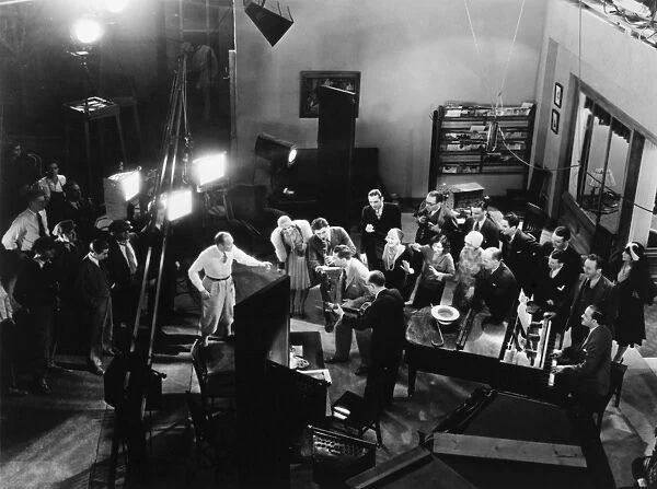 BROADWAY MELODY, 1929. Actors and film crew on the set of Broadway Melody. Photograph