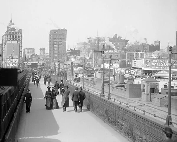 BROOKLYN BRIDGE, c1905. People walking on the entrance to the bridge, New York