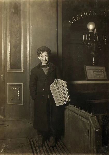 BROOKLYN NEWSBOY, 1909. Twelve-year old illiterate boy working through the night