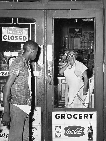 BROOKLYN: RIOTS, 1964. Mrs. Anna Kelter reacts to the damage done to her store