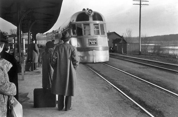 BURLINGTON ZEPHYR, 1940. Awaiting the arrival of the Burlington Zephyr in East Dubuque, Illinois
