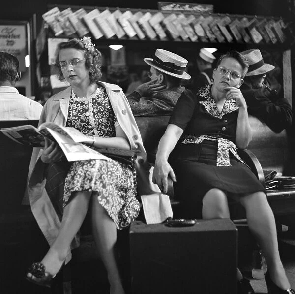 BUS STATION, 1943. Passengers in the waiting room of the Greyhound station in Pittsburgh