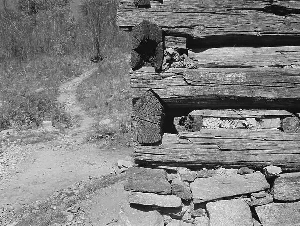 CABIN CONSTRUCTION, 1935. A detail of the construction of a cabin in Corbin Hollow