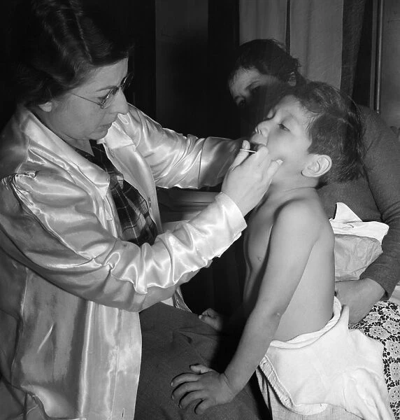 CALIFORNIA: DOCTOR, 1939. A traveling public health doctor conducting a well-baby
