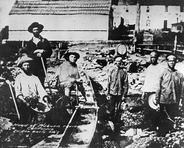 CALIFORNIA GOLD RUSH. White and Chinese prospectors at Auburn Ravine in the Sierra