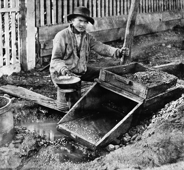 CALIFORNIA: MINING, c1866. A miner at work in Columbia, Tuolumne County, California