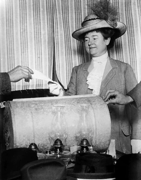 CALIFORNIA: WOMAN VOTING. Annie Marshall Reid Rolph, wife of San Francisco mayor James Rolph, voting at a polling station c1911. California adopted womens suffrage in 1911