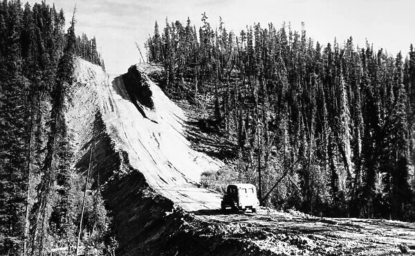 CANADA: ALASKA HIGHWAY. View along the Alaska Highway, in northern British Columbia and the Yukon Territory in western Canada, at the time of its construction, under the direction of the U. S. Army, c1942-43