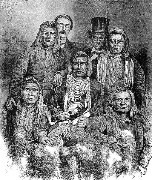 CAPTAIN JACK. Modoc chief. Captain Jack (center) with some of his comrades including John Schonshin (upper right), Hooker Jim (lower right) and Shac Nasty Jim (lower left). Wood engraving, 1873